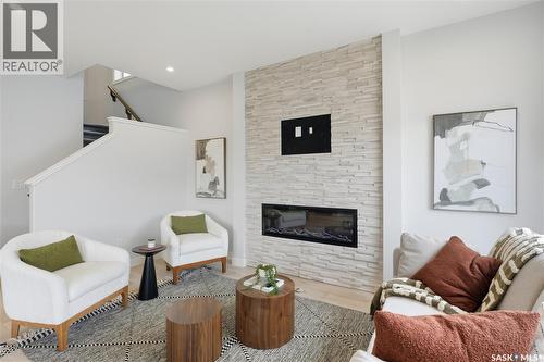 2969 Green Turtle Road, Regina, SK - Indoor Photo Showing Living Room With Fireplace