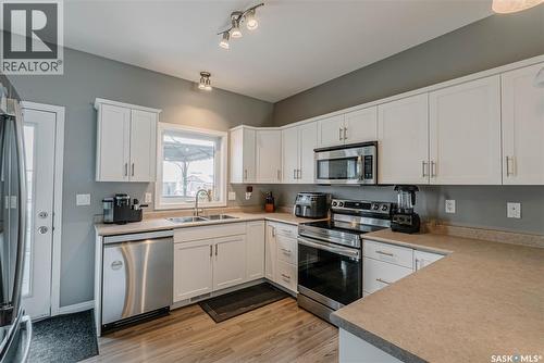 714 Sutter Crescent, Saskatoon, SK - Indoor Photo Showing Kitchen With Double Sink