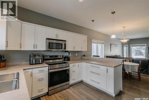 714 Sutter Crescent, Saskatoon, SK - Indoor Photo Showing Kitchen With Double Sink