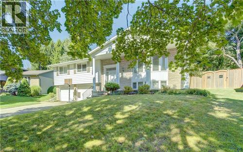 Split-level residence featuring a brick and siding exterior - 106 Autumn Hill Crescent, Kitchener, ON - Outdoor