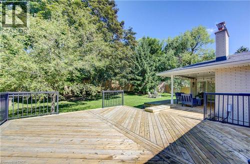 Expansive wood deck with geometric plank pattern and black metal railings - 106 Autumn Hill Crescent, Kitchener, ON - Outdoor With Deck Patio Veranda