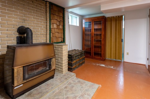 Salle familiale - 2143 Rue Labelle, Shawinigan, QC - Indoor With Fireplace