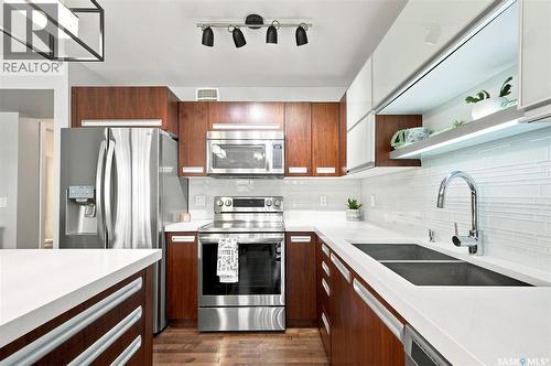 203 2007 Pohorecky Crescent, Saskatoon, SK - Indoor Photo Showing Kitchen With Stainless Steel Kitchen With Double Sink With Upgraded Kitchen
