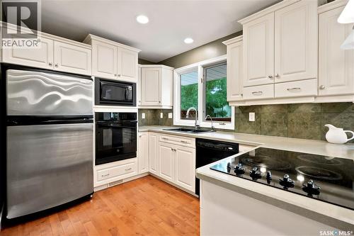 19 Thomson Avenue, Regina, SK - Indoor Photo Showing Kitchen With Double Sink