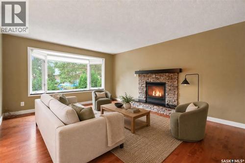 19 Thomson Avenue, Regina, SK - Indoor Photo Showing Living Room With Fireplace