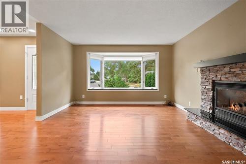 19 Thomson Avenue, Regina, SK - Indoor Photo Showing Living Room With Fireplace