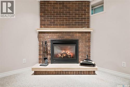 19 Thomson Avenue, Regina, SK - Indoor Photo Showing Living Room With Fireplace