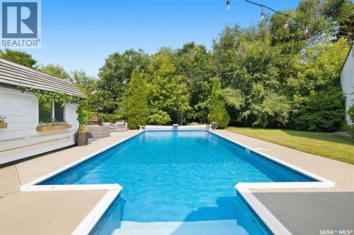 35 Ridgedale Bay, White City, SK - Outdoor With In Ground Pool With Backyard