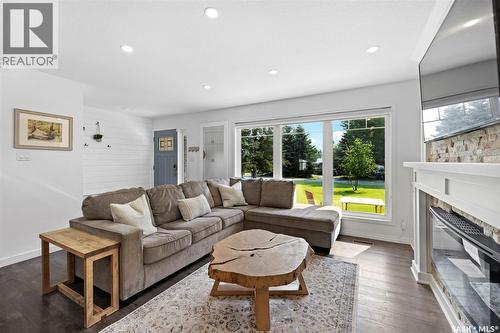 35 Ridgedale Bay, White City, SK - Indoor Photo Showing Living Room With Fireplace