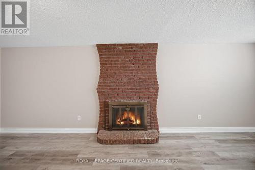 33 Grassmere Crescent, Brampton, ON - Indoor Photo Showing Living Room With Fireplace