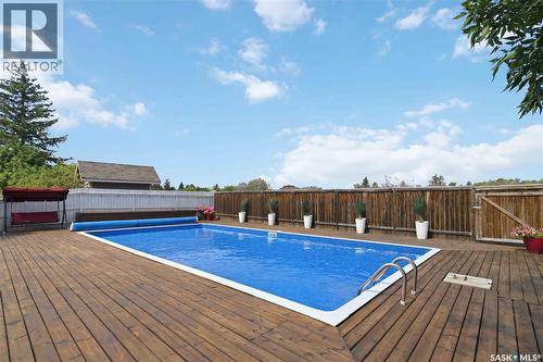 122 Assiniboine Drive, Saskatoon, SK - Outdoor With Above Ground Pool With Deck Patio Veranda