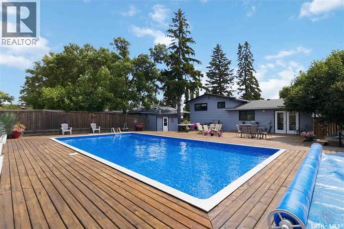 122 Assiniboine Drive, Saskatoon, SK - Outdoor With In Ground Pool With Backyard