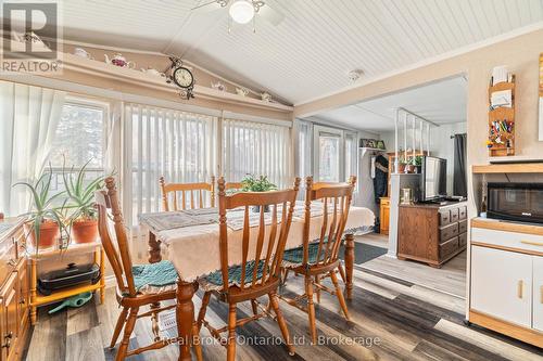 524 Poplar Place, Centre Wellington, ON - Indoor Photo Showing Dining Room With Fireplace
