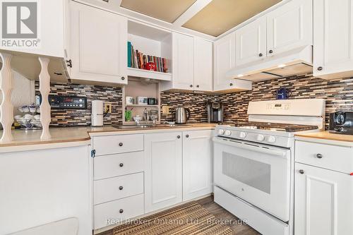 524 Poplar Place, Centre Wellington, ON - Indoor Photo Showing Kitchen With Double Sink