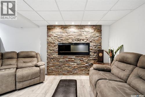 114 Mcsherry Crescent, Regina, SK - Indoor Photo Showing Living Room With Fireplace