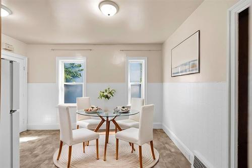 Dining area - virtually staged for layout and design inspiration. - 301 Langside Street, Winnipeg, MB - Indoor Photo Showing Dining Room