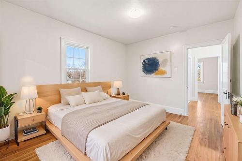 Bedroom 1 - virtually staged for layout and design inspiration. - 301 Langside Street, Winnipeg, MB - Indoor Photo Showing Bedroom