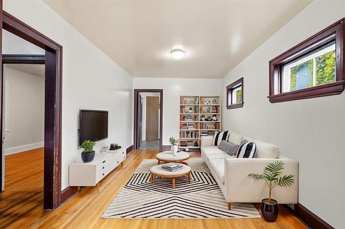 Living room - virtually staged for layout and design inspiration. - 301 Langside Street, Winnipeg, MB - Indoor Photo Showing Living Room