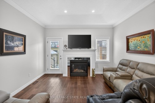 36 Banks Street, Brantford, ON - Indoor Photo Showing Living Room With Fireplace