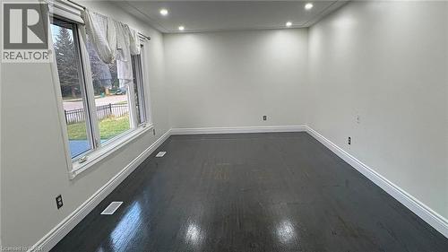 Hardwood flooring, recessed lighting, crown molding, white trim, and multiple windows - 161 Kipling Avenue, Kitchener, ON - Indoor Photo Showing Other Room