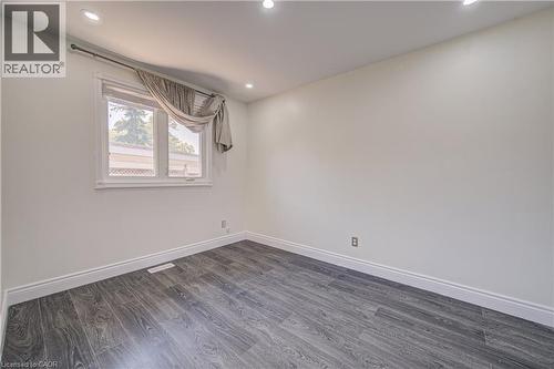 Recessed ceiling lighting, wood-finish flooring, and white walls - 161 Kipling Avenue, Kitchener, ON - Indoor Photo Showing Other Room