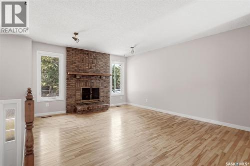1250 Mcneill Crescent, Regina, SK - Indoor Photo Showing Living Room With Fireplace
