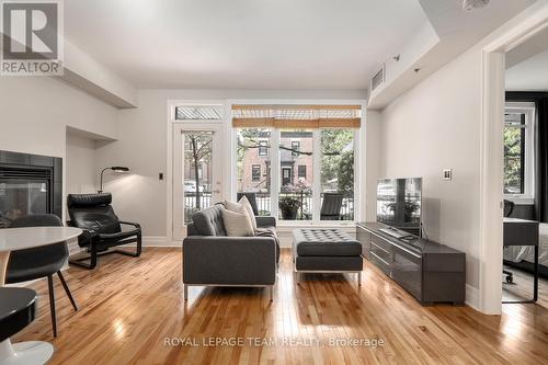 101 - 457 Mcleod Street, Ottawa, ON - Indoor Photo Showing Living Room With Fireplace