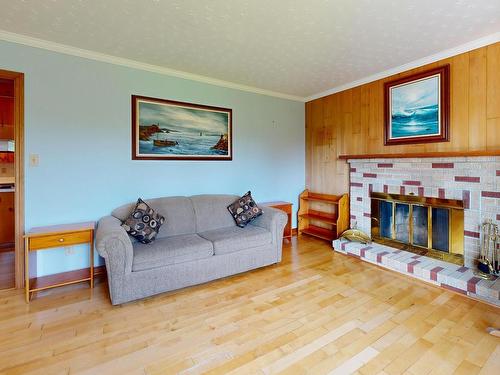 56 North Side Road, Riverport, NS - Indoor Photo Showing Living Room With Fireplace