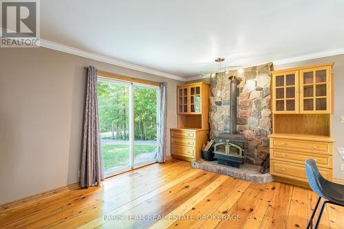 2554 Champlain Road, Tiny, ON - Indoor With Fireplace