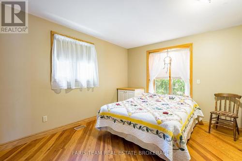 2554 Champlain Road, Tiny, ON - Indoor Photo Showing Bedroom