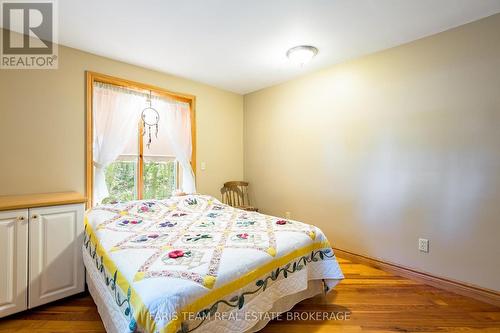 2554 Champlain Road, Tiny, ON - Indoor Photo Showing Bedroom