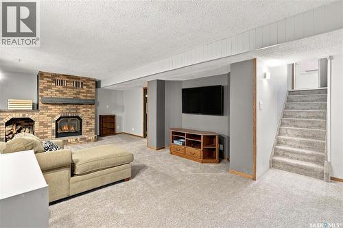 1409 Duffield Street W, Moose Jaw, SK - Indoor Photo Showing Living Room With Fireplace