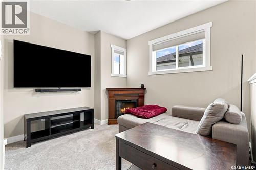 435 Myles Heidt Manor, Saskatoon, SK - Indoor Photo Showing Other Room With Fireplace