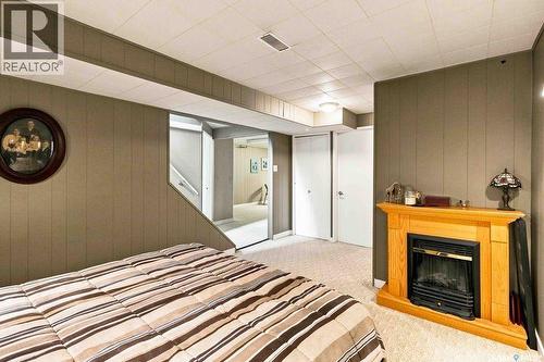 2602 Paul Crescent, Saskatoon, SK - Indoor Photo Showing Bedroom With Fireplace