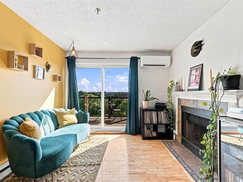 401 3600 John Parr Drive, Halifax, NS - Indoor Photo Showing Living Room With Fireplace