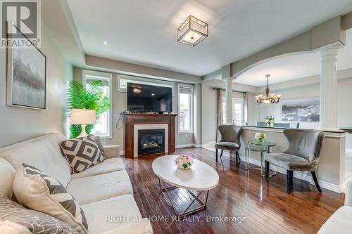 38 Assisi Street, Hamilton, ON - Indoor Photo Showing Living Room With Fireplace