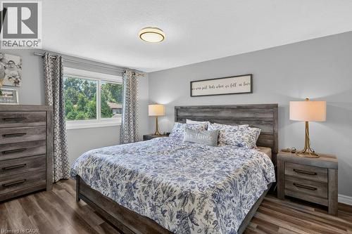Wood-finish flooring, recessed lighting, and a window with exterior views - 60 Elford Crescent, Hamilton, ON - Indoor Photo Showing Bedroom
