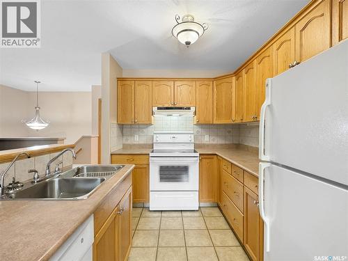 Unit 5 2321 Kildeer Drive, North Battleford, SK - Indoor Photo Showing Kitchen With Double Sink