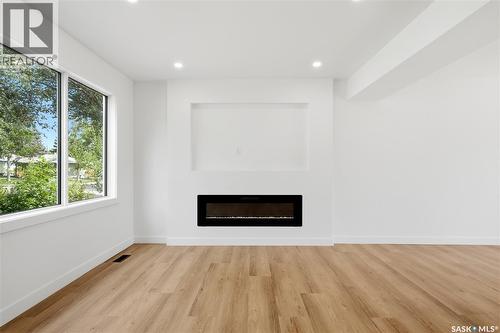 3638 Argyle Road, Regina, SK - Indoor Photo Showing Living Room With Fireplace