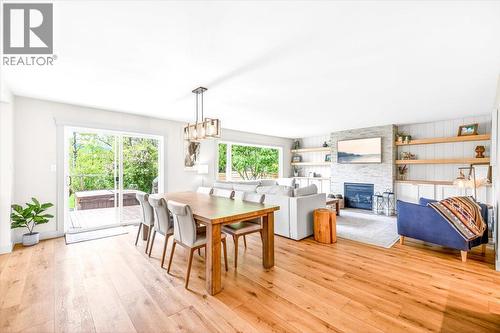 39 Elkview Drive, Fernie, BC - Indoor Photo Showing Dining Room With Fireplace