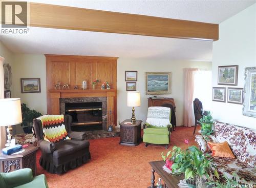 639 Acadia Drive, Saskatoon, SK - Indoor Photo Showing Living Room With Fireplace