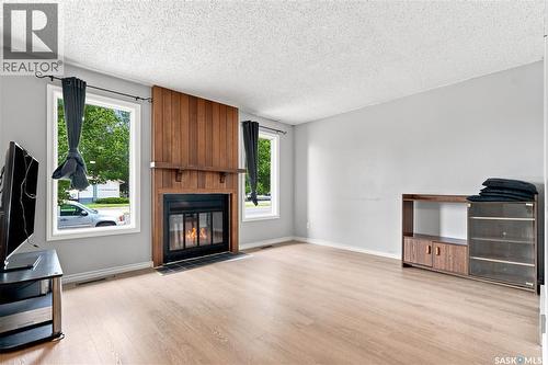 1718 Mckercher Drive, Saskatoon, SK - Indoor Photo Showing Living Room With Fireplace