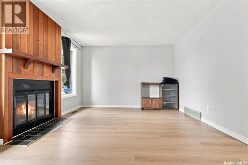 1718 Mckercher Drive, Saskatoon, SK - Indoor Photo Showing Other Room With Fireplace