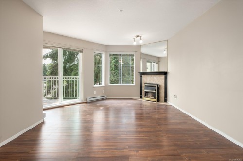 #206-24 Prideaux St, Nanaimo, BC - Indoor Photo Showing Other Room With Fireplace