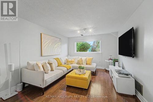 bright family room overlooking pool - 117 Clappison Boulevard, Toronto, ON - Indoor Photo Showing Living Room