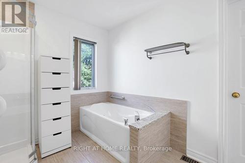 Separate soaker tub! - 53 Yoho Drive, Ottawa, ON - Indoor Photo Showing Bathroom
