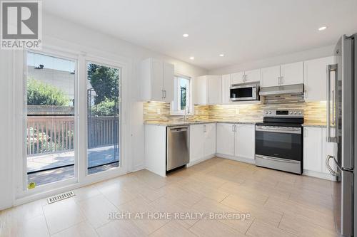 An eat-in design with a great view! - 53 Yoho Drive, Ottawa, ON - Indoor Photo Showing Kitchen With Stainless Steel Kitchen