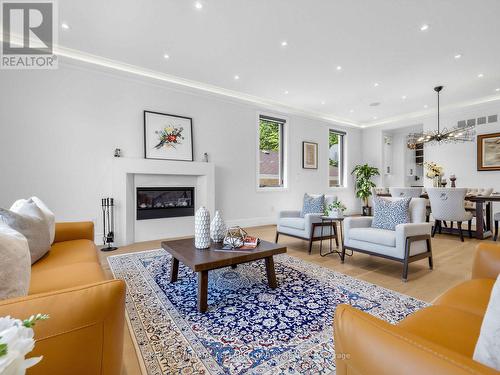 35 Lloydminster Crescent, Toronto, ON - Indoor Photo Showing Living Room With Fireplace