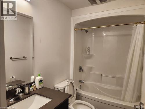 Full bathroom featuring toilet, shower / tub combo, visible vents, and vanity - 269 Sunview Street Unit# 607, Waterloo, ON - Indoor Photo Showing Bathroom