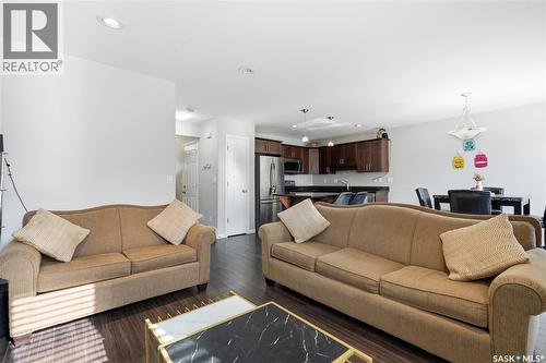 14 502 Rempel Manor, Saskatoon, SK - Indoor Photo Showing Living Room